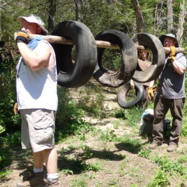 Team Fords River with Dozens of Tires